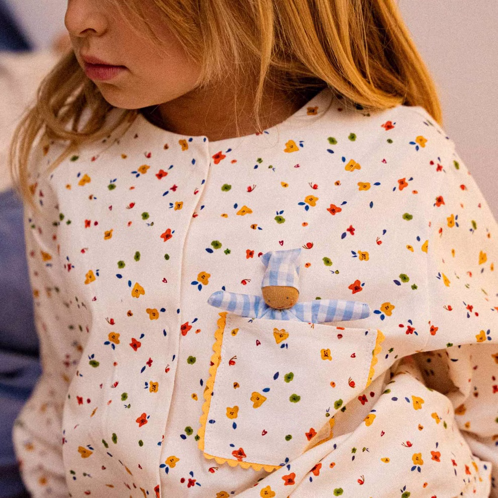 Baby mit Schlafsack, karo blau Baby mit Schlafsack, karo blau
