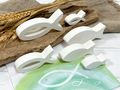 Deko Set Kommunion Motiv Regenbogen Grün – Servietten, Holzfische & personalisierbare Windlichter 3