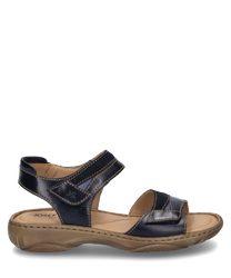 La sandale en denim/combi est fabriquée en cuir de haute qualité avec une fermeture velcro confortable. Elle a une semelle robuste et offre un confort de port optimal.
