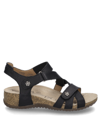 Sandale noire avec fermeture Velcro fabriquée en cuir. Elle possède une semelle en liège ergonomique et des applications florales décoratives sur les sangles.