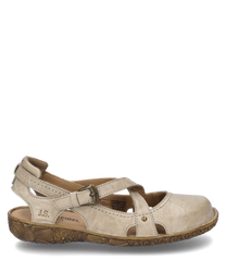 Sandalo beige in pelle con fibbia decorativa e suola strutturata e comoda. Il taglio aperto offre traspirabilità mentre la fibbia garantisce una tenuta sicura.