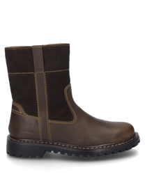 La botte de couleur moro est fabriquée en cuir de haute qualité avec des coutures visibles et une fermeture éclair comme fermeture. Elle se distingue par un design robuste avec une semelle profilée.
