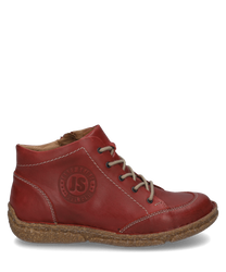 La bota en color hibisco está hecha de cuero de alta calidad y cuenta con una cremallera lateral. El zapato tiene una suela robusta y un discreto logo de JS en el lado exterior.