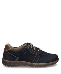 La chaussure basse dans la couleur 'ocean-kombi' est en cuir bleu foncé avec des lacets décoratifs clairs. Elle dispose d'un laçage et d'un contrefort contrastant en marron ce qui donne à la chaussure une touche élégante.