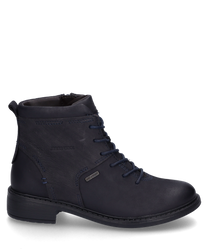 L'ankle boot nel colore Ocean colpisce per il suo design elegante e la pratica chiusura lampo. Il materiale di alta qualità garantisce durata e comfort.