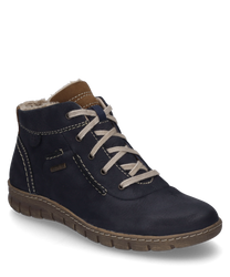 Die Stiefelette in der Farbe Ocean-Kombi besteht aus einem robusten dunkelblauen Material mit heller Schnürung und braunen Akzenten. Der Schuh ist mit einer weichen Innenfütterung ausgestattet die für zusätzlichen Komfort sorgt.