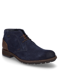 Die Stiefelette in der Farbgebung 'jeans-kombi' besteht aus dunkelblauem Veloursleder mit braunen Akzenten im Fersenbereich. Sie verfügt über eine Schnürung als Verschluss und eine robuste Sohle für optimalen Halt.