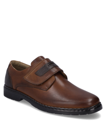 Der Halbschuh in cognac-kombi zeigt ein elegantes Design mit einem praktischen Klettverschluss. Das hochwertige Leder verleiht dem Schuh eine glatte Oberfläche und einen edlen Look.