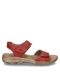 Sandalo rosso con chiusura in velcro realizzato in pelle liscia. La suola è in materiale chiaro e strutturato e offre una buona aderenza.