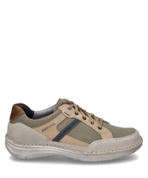 Beige lace-up shoe made of textile and leather. The shoe features brown and blue accents as well as a white sole.