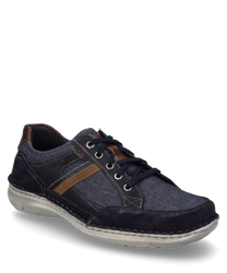 Modern lace-up shoe made of blue and brown leather and light gray fabric. Striking decorative seams and contrasting brown stripes give the shoe a stylish look.