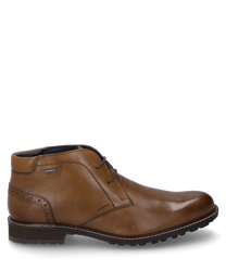 Die Stiefelette aus braunem Leder zeichnet sich durch eine elegante Schnürung und dezente Zierperforationen an der Ferse aus. Der robuste Lederschuh bietet eine strapazierfähige Sohle für optimalen Halt.