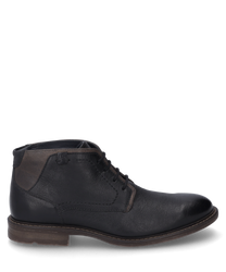 Die Stiefelette in schwarz-kombi besteht aus glattem Leder und hat eine stilvolle Schnürung. Der Schuh zeichnet sich durch einen abgerundeten Zehenbereich und einen kontrastierenden Fersenbereich aus.