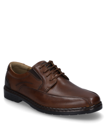 The half shoe in the color cognac is made of smooth leather with lacing. Notable are the fine decorative stitches and the robust sole which provide an elegant look.
