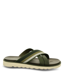 Green sandal with crossed straps made of synthetic material without closure. The sole is beige with a slight profile for better grip.