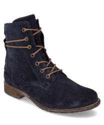 The ankle boot in the color Ocean is made of a soft velvety material and features a zipper. It is characterized by a sturdy sole and subtle lace details.
