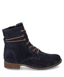 The ankle boot in the color Ocean is made of a soft velvety material and features a zipper. It is characterized by a sturdy sole and subtle lace details.