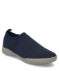 Il mocassino è realizzato in materiale a maglia blu scuro e presenta un comodo elastico in gomma come chiusura. La suola è di un beige a contrasto il che conferisce alla scarpa un aspetto moderno.