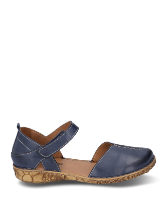 Blue leather sandal with Velcro closure. The sole is patterned and gives the shoe a special accent.