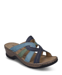 The clog is made of leather and features a multicolored design in shades of blue and green. It has a comfortable elastic closure and a sturdy sole for optimal grip.