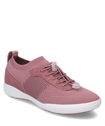 A pink sneaker with lacing made from breathable knitted material. The shoe features a white sole and a simple modern design.