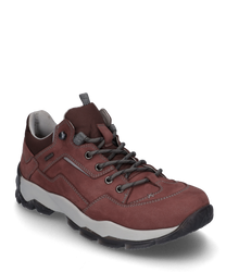 The shoe is made of sturdy reddish-brown leather and features gray laces. Notable characteristics include the contrasting white sole and the reinforced heel area for additional support.