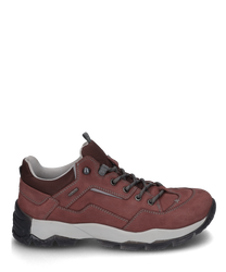 The shoe is made of sturdy reddish-brown leather and features gray laces. Notable characteristics include the contrasting white sole and the reinforced heel area for additional support.