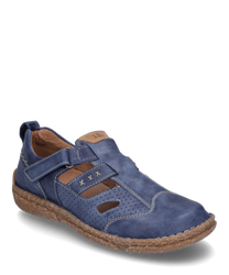 De halfhoge schoen van blauw leer heeft een praktische klittenbandsluiting. Bijzondere kenmerken zijn de decoratieve kruissteek en het geperforeerde oppervlak voor verbeterde ademend vermogen.