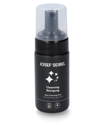 Der JS Reinigungsschaum Clean ist in einer weißen zylindrischen Kunststoffflasche mit blauem Etikett erhältlich. Die Flasche hat einen weißen Pumpverschluss und das Etikett zeigt blaue und weiße Schrift.