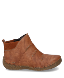 La botte en cuir marron se distingue par son look naturel et sa semelle robuste cousue. La fermeture éclair latérale permet de l'enfiler et de l'enlever facilement tandis que les coutures soignées garantissent une durabilité.