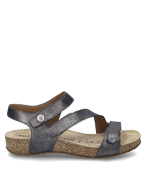The illustrated sandal in anthracite is made of a shimmering material and features a practical Velcro closure. The shoe has a comfortable slightly profiled sole and is ideal for summer.