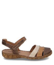 Brown sandal with Velcro closure made of leather. The sole is adorned with floral patterns and the design features light and dark brown stripes.