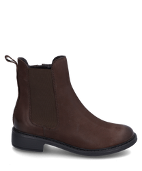 Brown ankle boot with elastic made of smooth leather. The shoe features a sturdy flat sole and a side elastic insert for easy on and off.