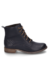 La botte en couleur Océan est fabriquée en cuir de haute qualité et dispose d'un laçage pour un maintien optimal. La chaussure a une semelle robuste et est idéale pour une apparence élégante et confortable.