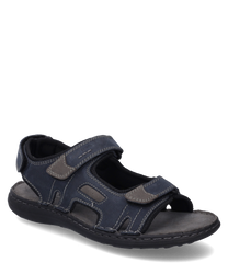 La sandalo è realizzato in pelle blu scuro con accenti grigi e dispone di pratiche chiusure in velcro. Offre una suola nera robusta e cuciture decorative alla moda per un ulteriore stile.