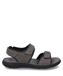 Sandale grise avec fermeture velcro fabriquée en matériau durable. La sandale offre un ajustement confortable et est idéale pour un usage quotidien.