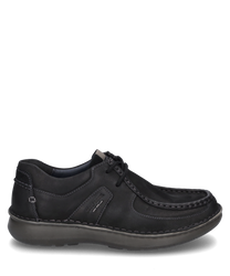Black leather lace-up shoe. The shoe features a sturdy sole and contrasting stitching for added style.