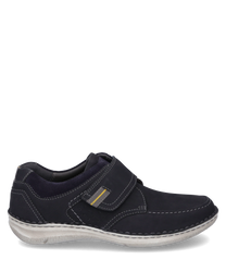 The dark blue leather shoe with Velcro offers comfort and style. Contrast stitching and a light gray sole give the shoe a modern look.
