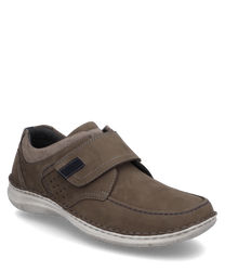 The brown leather shoe features a practical Velcro closure. Special features include contrasting stitching and perforated details on the side.