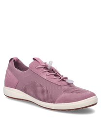 Pink sneakers with lacing made from a combination of mesh and suede. The shoe features a white sole and offers a comfortable fit.