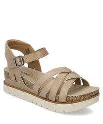 Sandalo beige con chiusura in velcro in morbida pelle. Le caratteristiche includono le cinghie incrociate e la suola imbottita di colore marrone chiaro con effetto sughero.