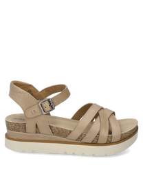 Sandalo beige con chiusura in velcro in morbida pelle. Le caratteristiche includono le cinghie incrociate e la suola imbottita di colore marrone chiaro con effetto sughero.