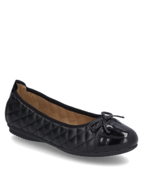 An elegant black ballerina shoe made of quilted material without closure. The shoe features a decorative bow on the front and a flat sole for comfort.