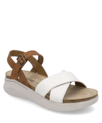 La sandalo ha cinturini in pelle bianchi e marroni con una chiusura in velcro regolabile. Ha una suola comoda e leggera e offre un comfort ottimale.