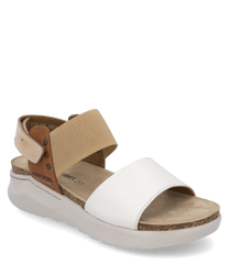 La sandalia tiene correas blancas y beige con un cierre de velcro. Está hecha de cuero y tiene una suela acolchada de color gris claro para mayor comodidad.