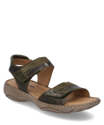 La sandale en cuir vert est dotée d'une fermeture velcro confortable. La semelle solide de couleur beige assure un confort de port optimal.
