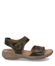 La sandale en cuir vert est dotée d'une fermeture velcro confortable. La semelle solide de couleur beige assure un confort de port optimal.