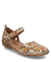 Sandale fleurie avec fermeture velcro fabriquée en matériau textile crème avec un motif floral coloré. Elle dispose d'une semelle confortable et structurée dans des tons naturels offrant un confort de port agréable.