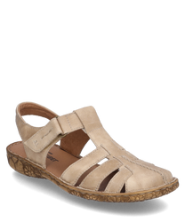 Beige sandal with Velcro closure made of soft leather. The sole features a natural patterned design ideal for comfort and style.
