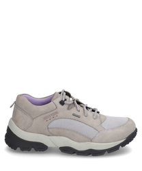 Beige lace-up shoe made of suede and mesh. The shoe features a sturdy black sole and a purple lining ideal for comfortable walking.